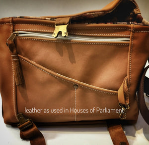 Upcycled medium sized leather shoulder bag