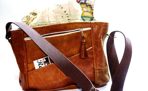 Upcycled medium sized leather shoulder bag